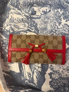 Gucci GG Canvas Wallet with Red Leather Trim and Tassels